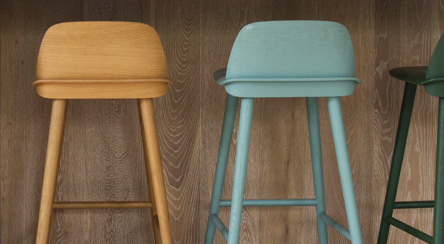 Colorful chairs against kitchen bench